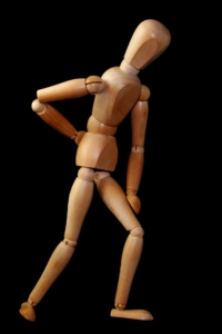 wooden figure  model with back pain